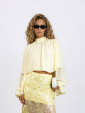 Ruffle cape Top